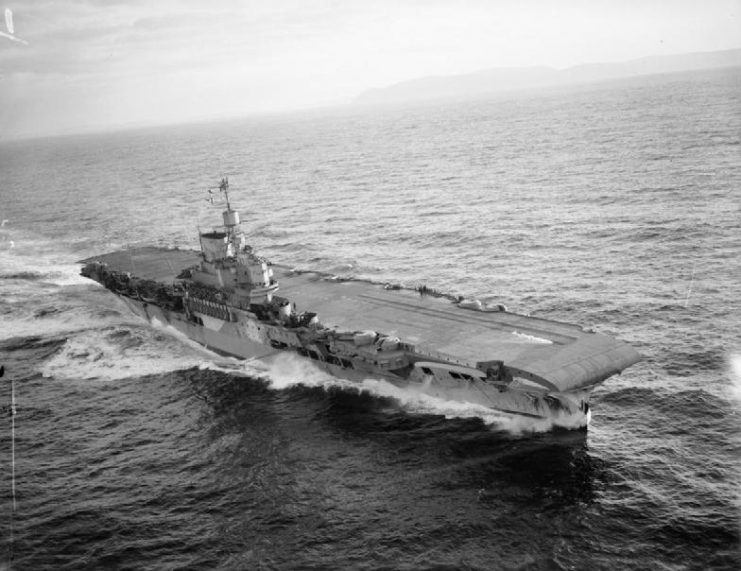 An aerial view of HMS Victorious at sea.1941