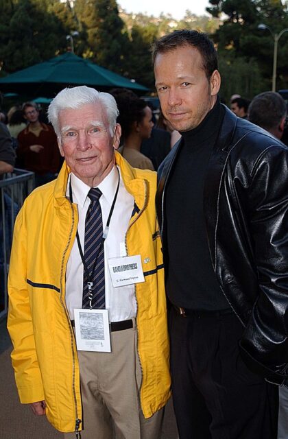 Carwood Lipton standing with Donnie Wahlberg