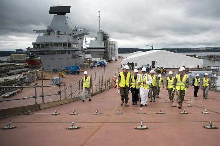 Chairman of the Joint Chiefs of Staff, Gen. Joseph Dunford Jr. tours the HMS Prince of Wales in 2017 – CC BY 2.0