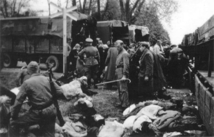 Chelmno extermination camp did not have direct rail connections. Jews were delivered by train to Koło, then to nearby Powiercie, and in overcrowded lorries to camp. They were forced to abandon their bundles along the way. At the manor house in Chełmno, they were compelled to undress for transport to a bath, unaware that it was the final stage of their lives. In this photo, loading of victims sent from the ghetto in Łódź