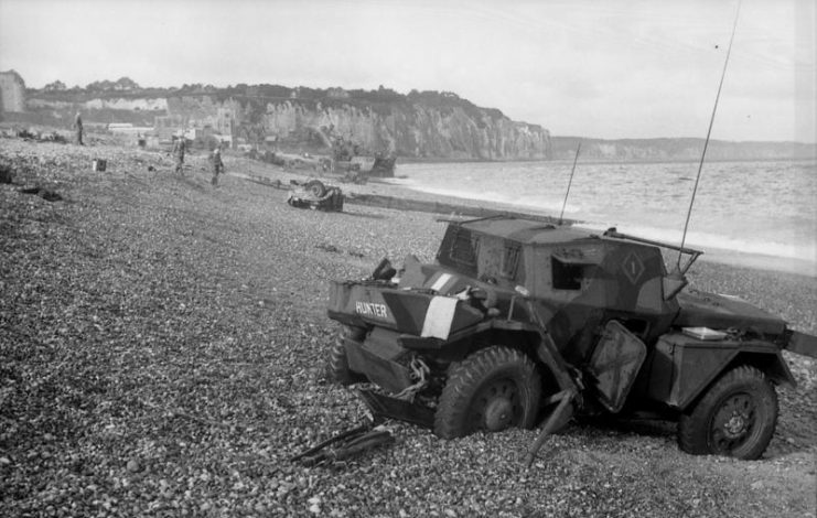 Dieppe’s chert beach and cliff immediately following the raid on 19 August 1942. A Dingo Scout Car has been abandoned.Photo: Bundesarchiv, Bild 101I-362-2211-04 / Jörgensen / CC-BY-SA 3.0