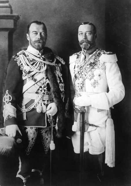 Emperor Nicholas II of Russia with his physically similar cousin, King George V of the United Kingdom (right), wearing German military uniforms in Berlin before the war, 1913