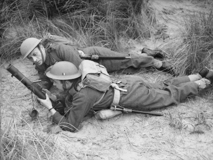 Free Belgian Forces fire a two-inch mortar