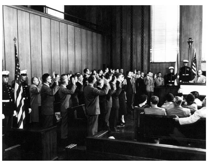 Thirty-nine of the German-born scientists at the U.S. Redstone Arsenal, along with the wives of two of the Operation Paperclip group, were sworn in as U.S. citizens at a 1954 naturalization ceremony.