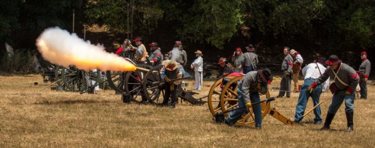 Men fire canon during Civil War Reenactment