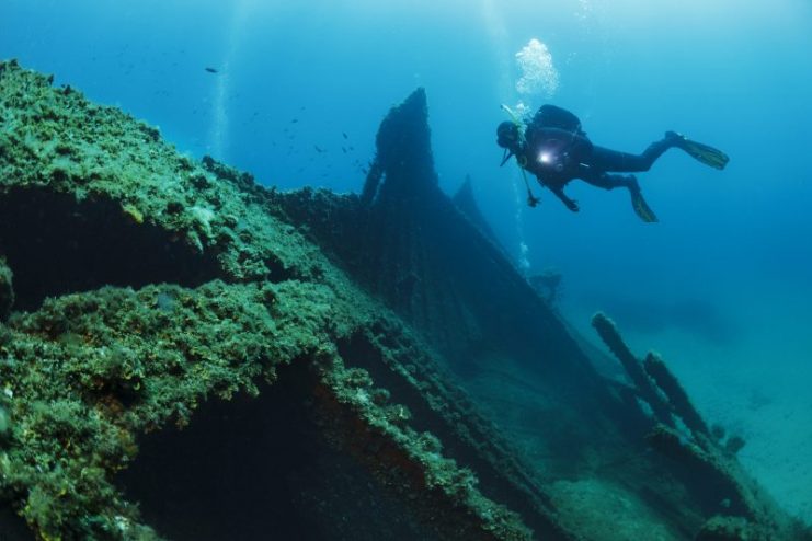 Wreck diving over a sunken ship