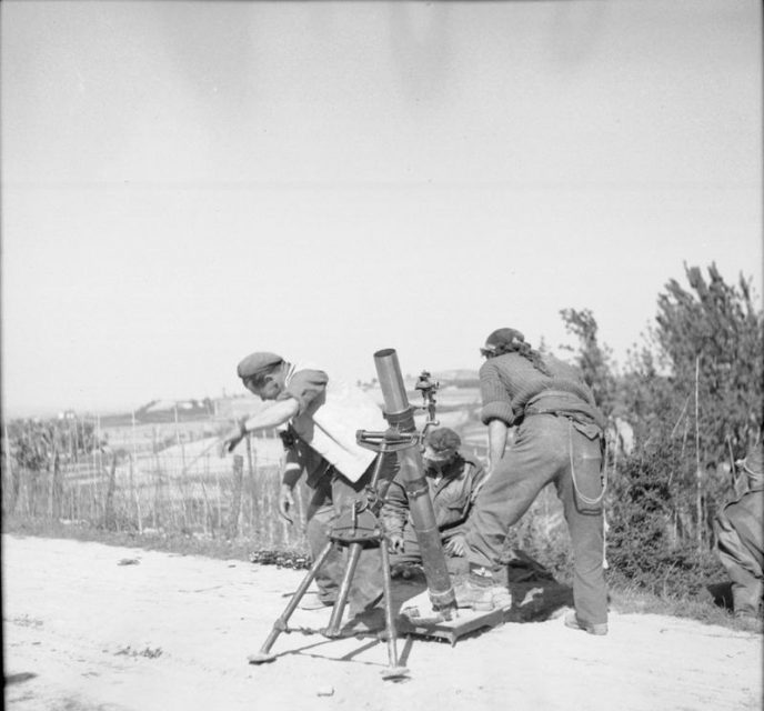 A 3-inch mortar team of 2 SAS in action in support of partisans in the Alba area of Italy.