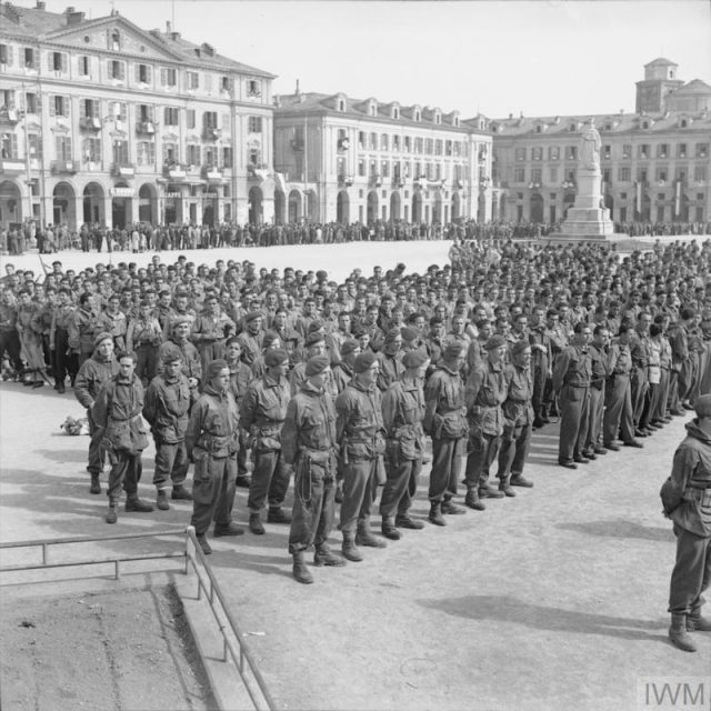 Men of 2 SAS attend an open-air mass in the Italian town of Cuneo, to celebrate the end of the war in Europe. © IWM (NA 25417)