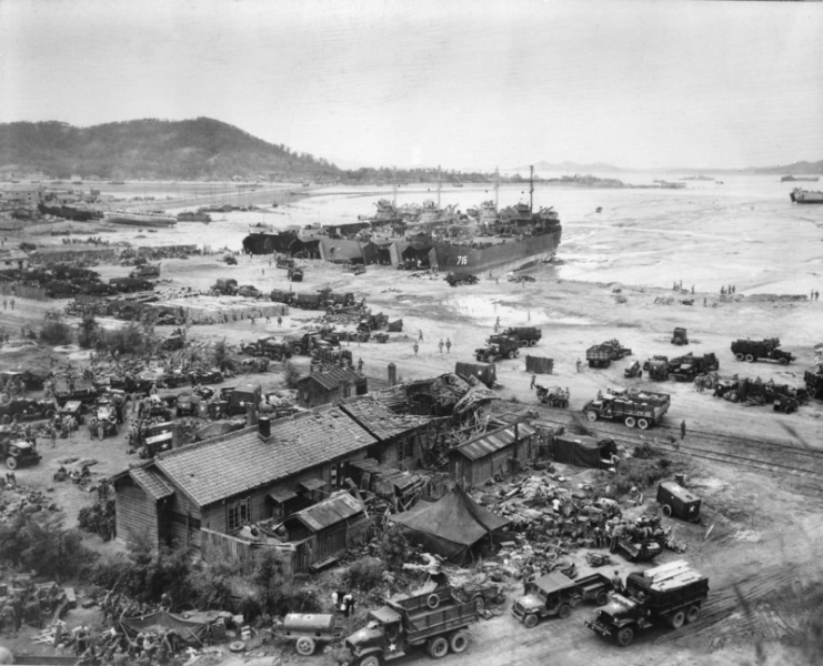 LSTs unloading at Inchon, 15 September 1950. American forces land in Inchon harbor one day after Battle of Inchon began.
