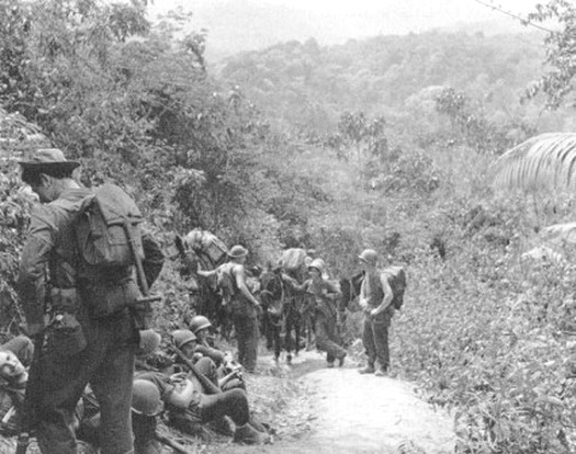 Marauders rest during a break along a jungle trail near Nhpum Ga.The 5307th Composite Unit (Provisional) code name GALAHAD became famous as Merrill’s Marauders