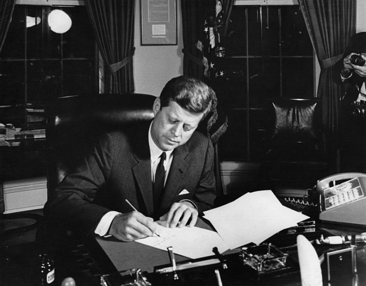 October 23, 1962: President Kennedy signs Proclamation 3504, authorizing the naval quarantine of Cuba.