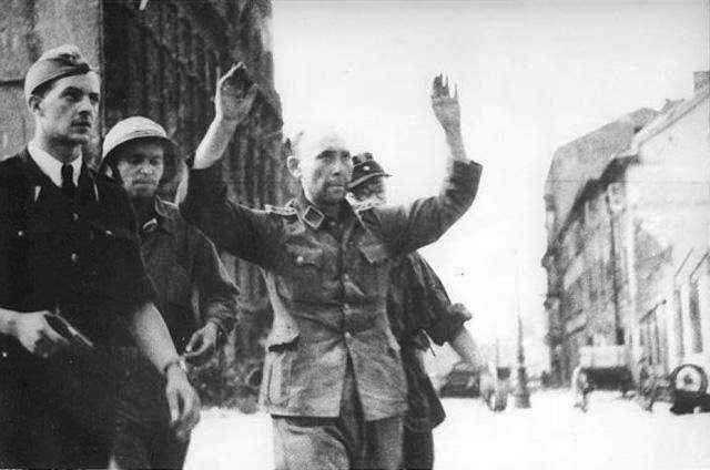 One of the German POW’s captured during the fighting at the PAST building located on Zielna Street,  August 20, 1944