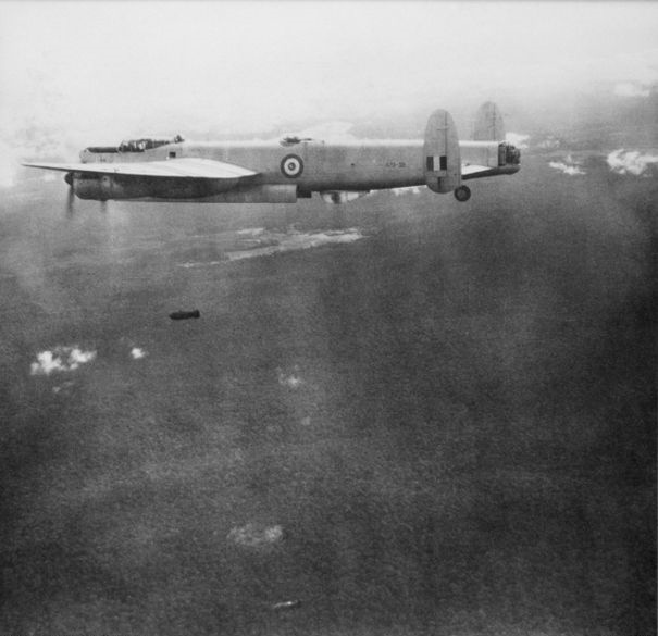 Avro Lincoln Bomber A73-33 of No. 1 Squadron RAAF on a bombing mission over the Malayan jungle.