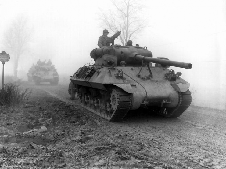 M3 90mm gun-armed American M36 tank destroyers of the 703rd TD, attached to the 82nd Airborne Division, move forward during heavy fog to stem German spearhead near Werbomont, Belgium, 20 December 1944.