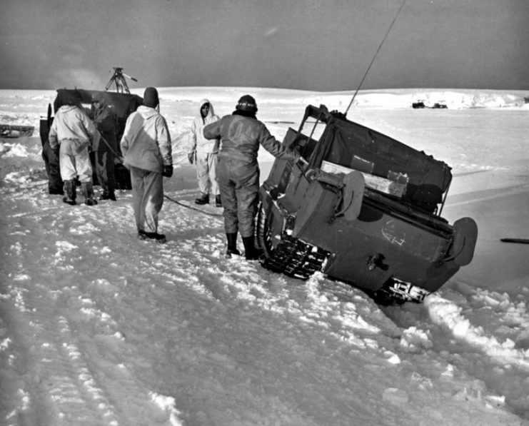 Two U.S. Navy M29 Weasel tracked vehicles on the ice in the Antarctic during Operation Highjump.