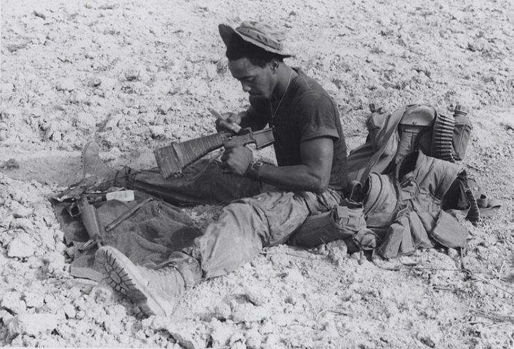 Marine Cleans his M-16 Rifle in Vietnam – USMC Archives CC BY 2.0