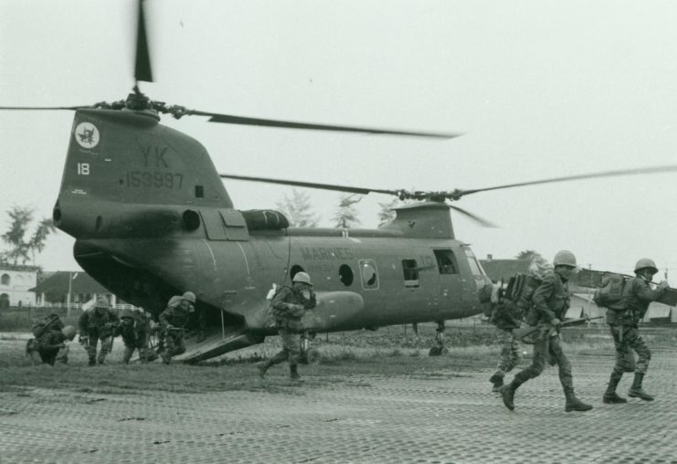 South Vietnamese Marines running from a Boeing Vertol CH-46 Sea Knight