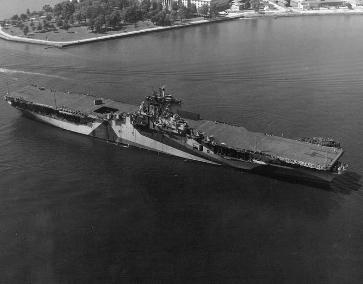 The U.S. Navy aircraft carrier USS Ticonderoga (CV-14) at anchor at Naval Air Station Hampton Roads, Virgina (USA) on 30 May 1944.