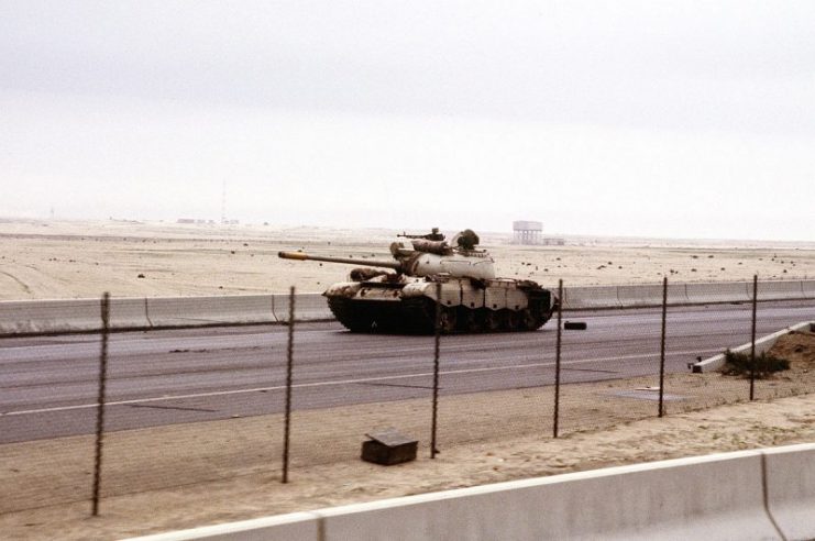 Iraqi Type 69 tank on the road into Kuwait City during the Gulf War.
