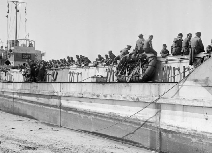 LCT 7074 on Gold Beach June 7 1944. Loaded with German prisoners.