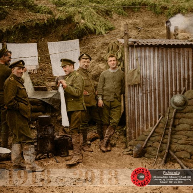 41. This photograph shows a group of soldiers standing in the entrance to a dugout. 