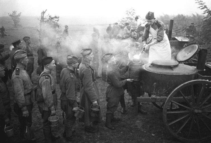 Russian WWII soldiers eating.