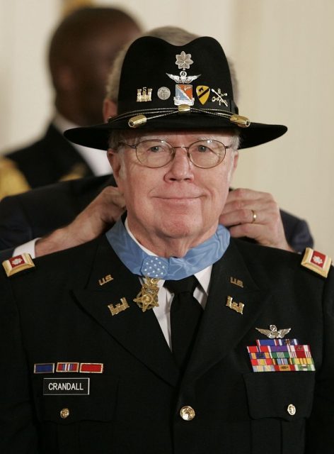 President Bush presents the Medal of Honor to retired Army Lt. Col. Bruce P. Crandall.