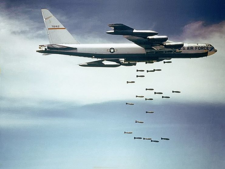 B-52F releasing its payload of bombs over Vietnam.