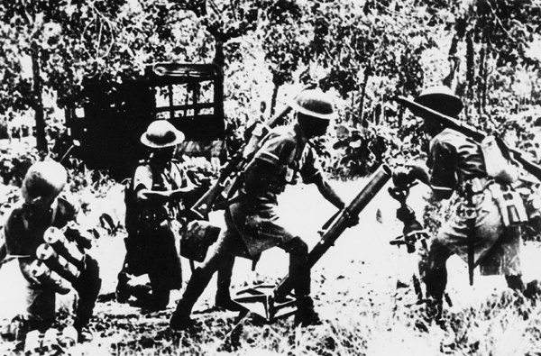 Royal Malay Regiment infantry with their mortar.