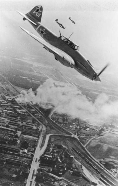 Three Russian aircraft Ilyushin Il-2 “Stormovik over Berlin during the Battle of Berlin.