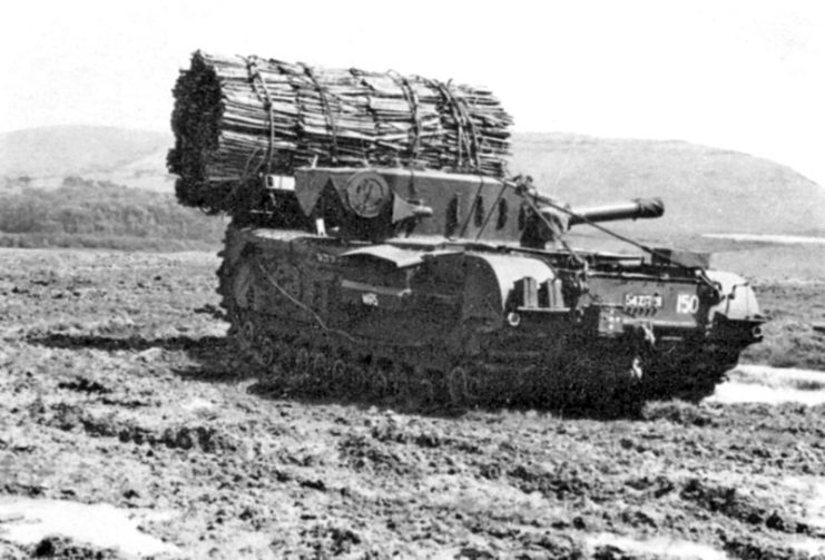 Churchill AVRE with fascine on tilt-forward cradle. This particular example is a post-WW2 AVRE on the MK VII chassis.