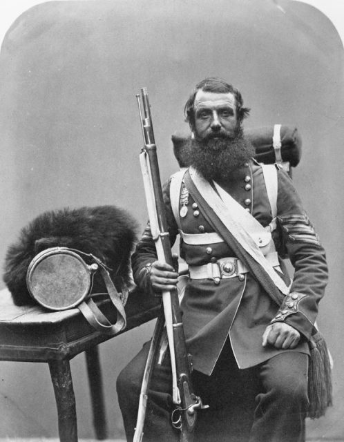 Portrait of Sergeant William Knapp, Coldstream Guards, with his pack and equipment.