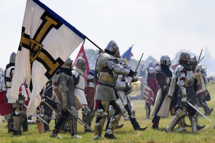 Dudutki, Belarus – July 19, 2014. Historical restoration of knightly combat during a festival of medieval culture ‘Our Grunwald,’ dedicated to 604 anniversary of Battle of Grunwald