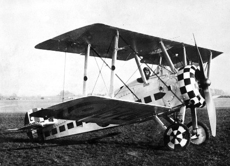 Harry Cobby sitting in the cockpit of a Sopwith Camel.