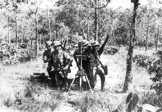 The Malay Regiment soldiers with mortar. Photo: IWM.