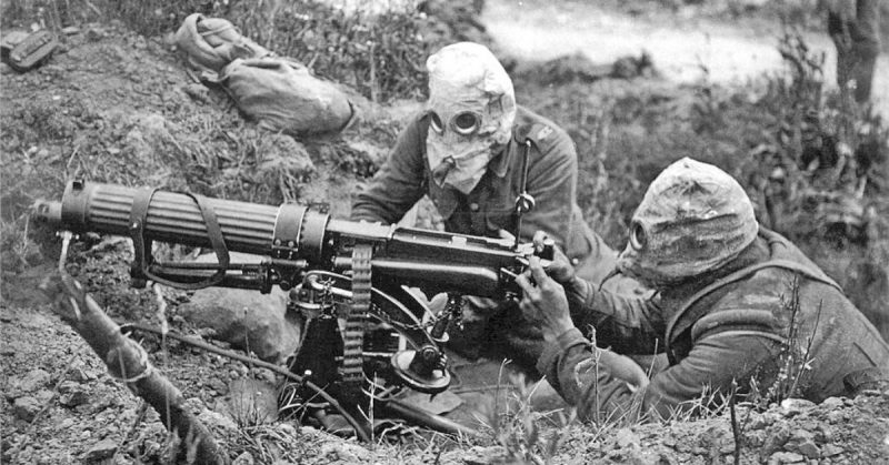 Vickers machine gun crew wearing gas helmets, near Ovillers July 1916