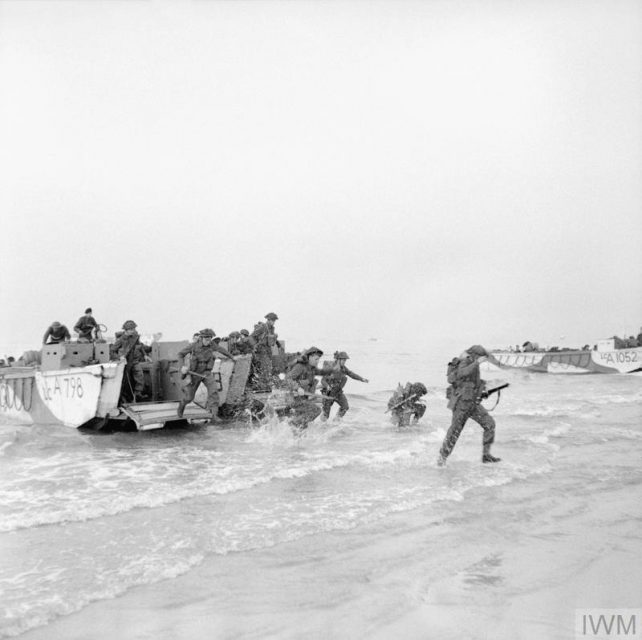 Troops storm ashore from LCAs (Landing Craft Assault) during Exercise ‘Fabius’, a major invasion rehearsal on the British coast, 5 May 1944. Nearest landing craft is LCA 798. IWM
