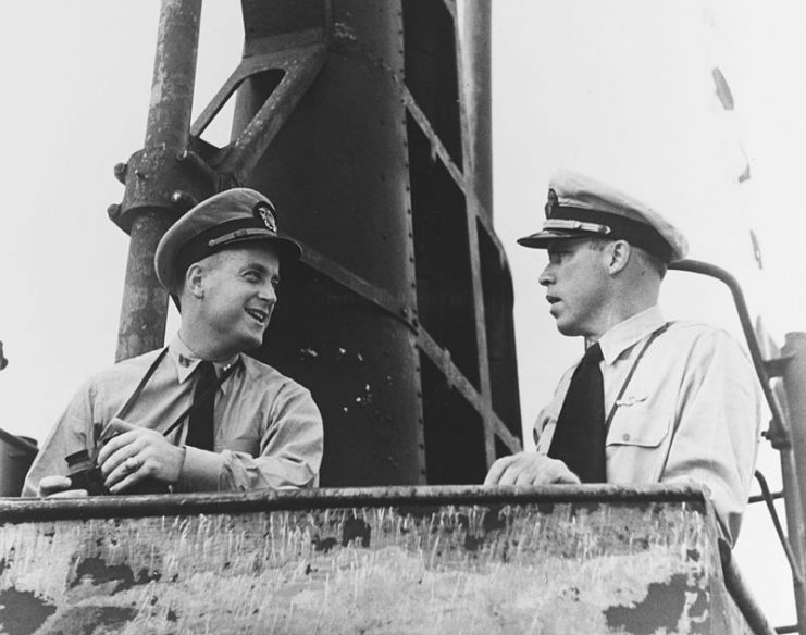 Morton speaks with his executive officer, Richard O’Kane on the bridge of the Wahoo ca. Feb 7, 1943