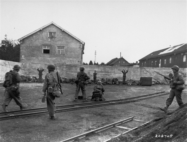 “No Mercy!”, by Arland B. Musser.Rather than taking them as POW’s, U.S. troops executed about 60 SS officers upon liberating Dachau.Photo: Tractatus CC BY-NC-SA 2.0