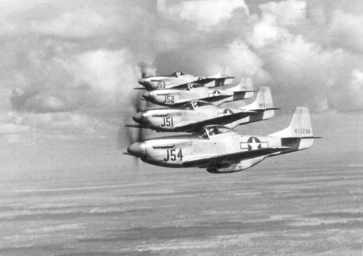 Mustangs 44-15238, 44-15053 over Sarasota FL.