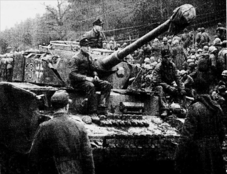 A Panzer IV H of Kampgruppe Peiper of the 1st SS Panzer Division Leibstandarte SS Adolf Hitler. The 101st Airborne Division fought this elite Waffen SS division when the 101st attacked towards Bourcy, northeast of Bastogne, on 13 January 1945.