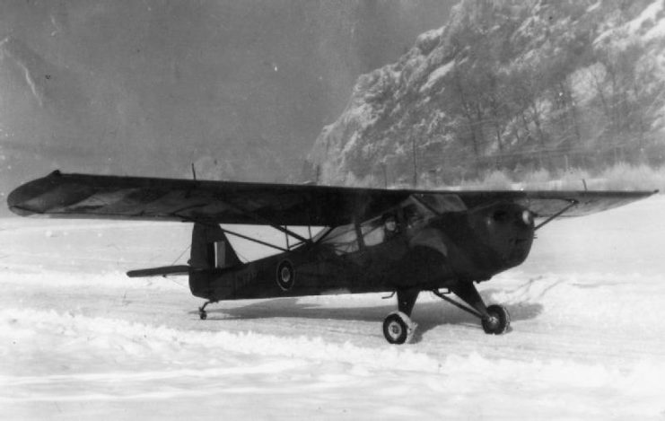Taylorcraft Auster Mark IV parked in the snow
