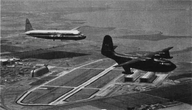 The Martin JRM-2 Caroline Mars and a Lockheed R6V-1 Constitution over Naval Air Station Moffett Field, California (USA), in 1951.