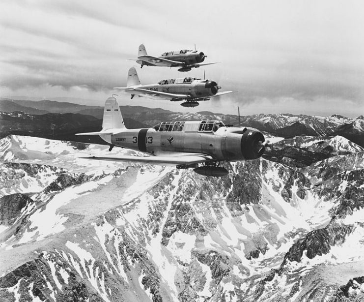 Three U.S. Navy Vought SB2U-1 Vindicator aircraft (BuNo 0739, 0740, 0741) of Bombing Squadron 3 (VB-3) “Tophatters” in flight over the Sierra Nevada range near Mount Whitney on 11 July 1938.