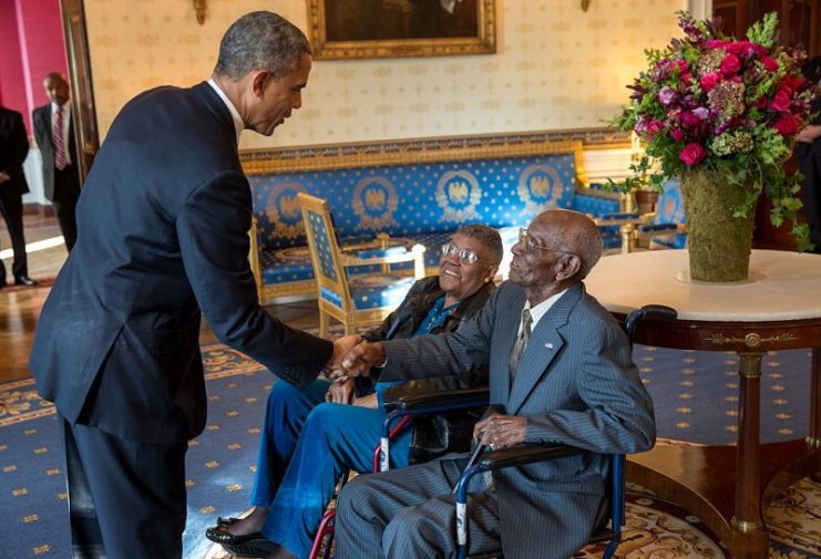 U.S. President Barack Obama greets Overton in the White House Blue Room, Veterans Day 2013.