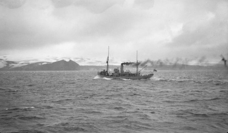 William Scoresby approaching Deception Island, 1944. (Photographer: James Edward Farrington, radio operator; Reproduced courtesy of the British Antarctic Survey Archives Service. Archives ref: AD6/19/1A/201/3). Copyright: Crown (expired).