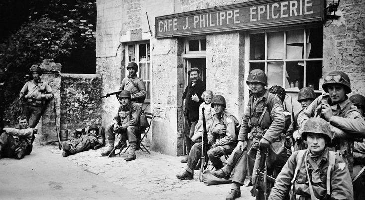 Café J.Philippe Epicerie with men from the US 4th division taking a rest. Photo taken June 6, 1944