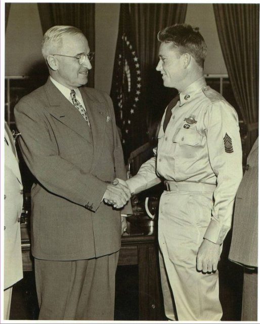 Silencing a pair of German machine-gun positions, and he helped a soldier trapped in a burning armored vehicle while under sniper fire.