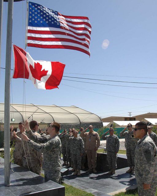 Coalition soldiers gather to commemorate the 65th anniversary of 1st Special Service Force in Bagram, Afghanistan on July 9, 2007.