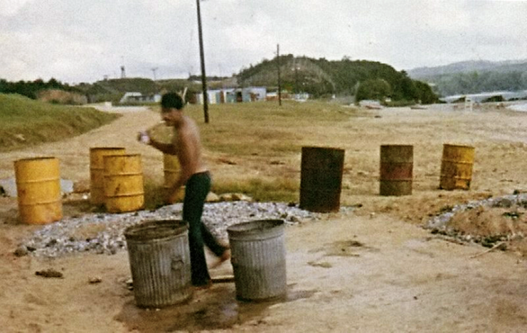 Agent Orange barrel on Okinawa and Marine Scott Parton on Okinawa 1971